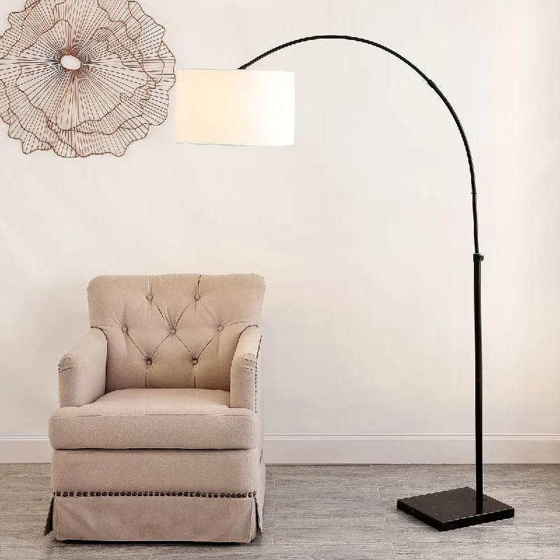 Metal Floor Lamp with a Matte Black Finish for a Sleek LookMetal Floor Lamp with a Matte Black Finish for a Sleek LookSAFAVIEH Lighting Josselyne 71-inch Floor Lamp - 17" W x 17" D x 71" H - Black - 17Wx17Dx71H